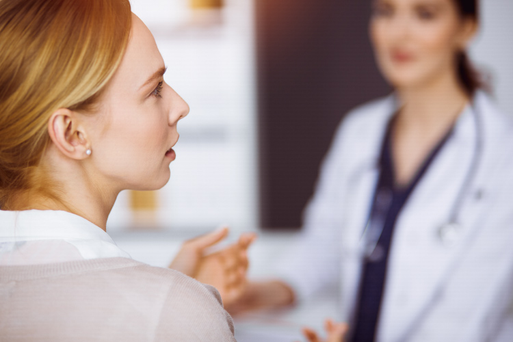 Patient talking to a medical professional.